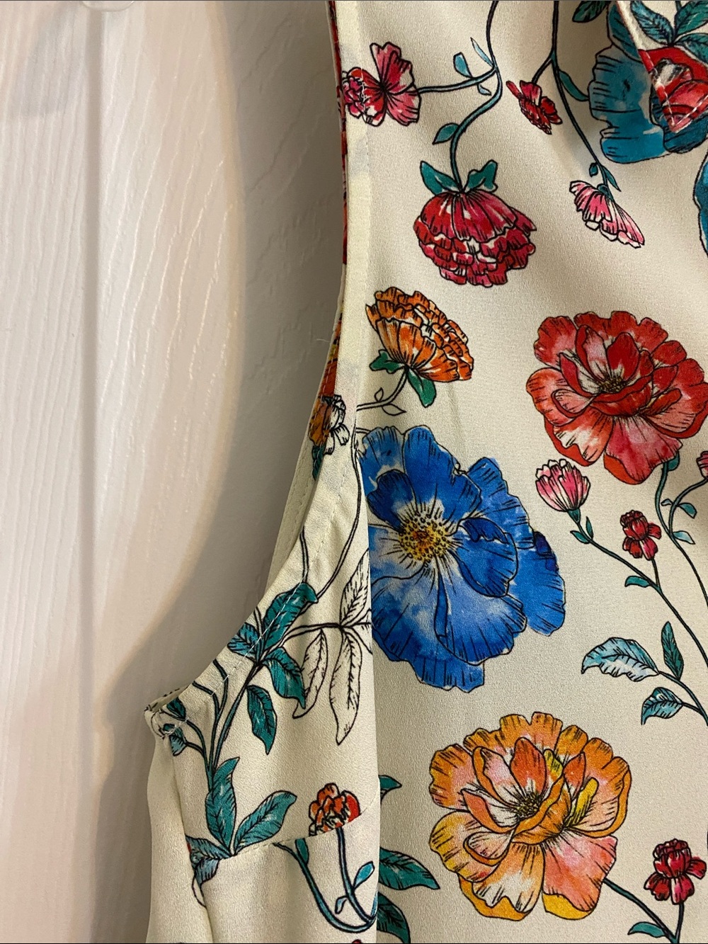Express Sleeveless Floral Button-Up Top in Cream, Blue, Red, Yellow - Picture 7 of 7
